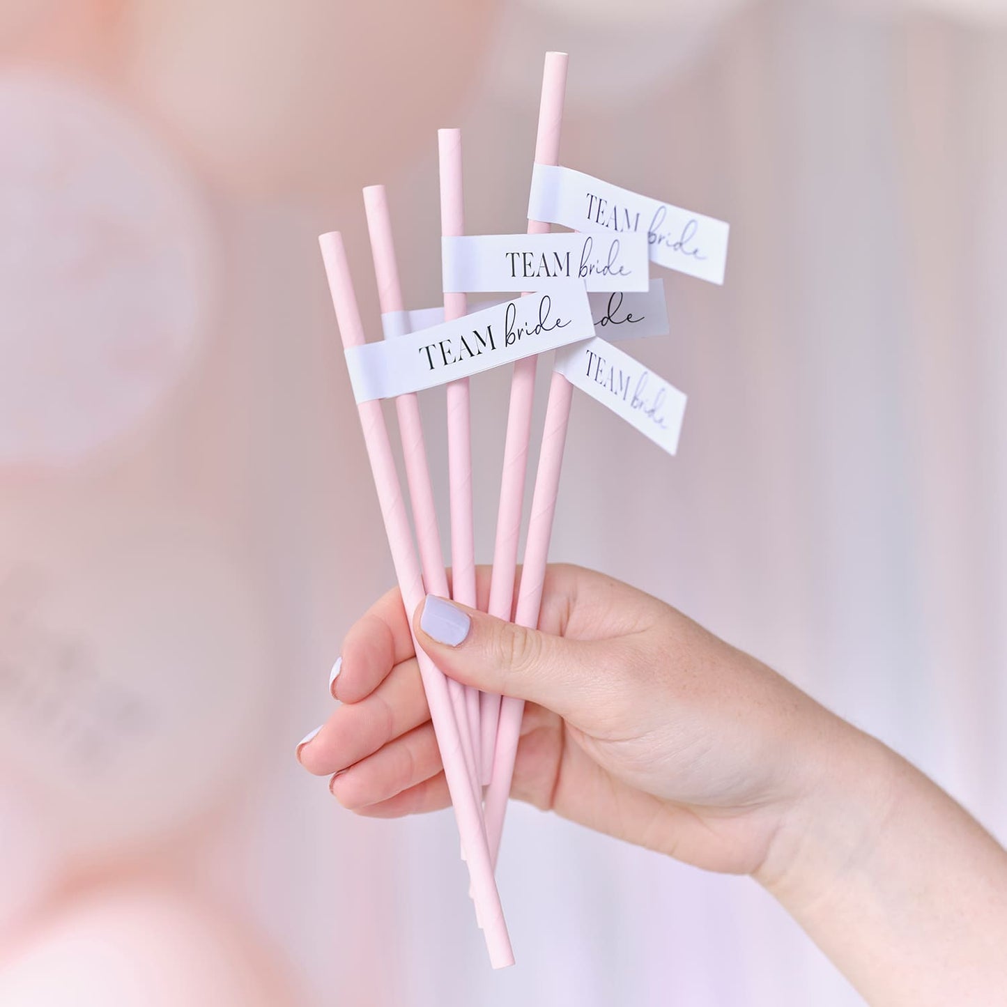 Pailles Rose pastel avec bandelettes "Team Bride" blanche écriture noire pour EVJF